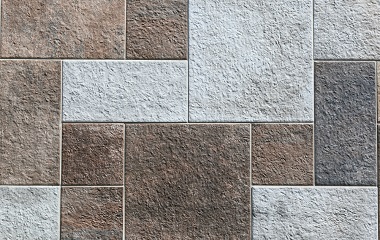 How to cut tiles with a spring-loaded knife